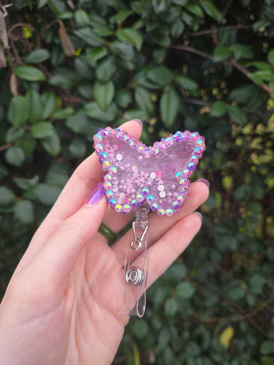 Purple butterfly badge reel shaker